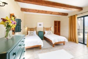 Letto o letti in una camera di Dar ta' Censina Villa with Private Pool