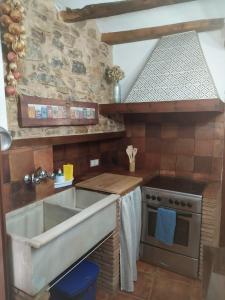 Η κουζίνα ή μικρή κουζίνα στο La casa del Herrero