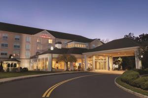 a hotel building with a road in front of it at Hilton Garden Inn Bridgewater in Bridgewater