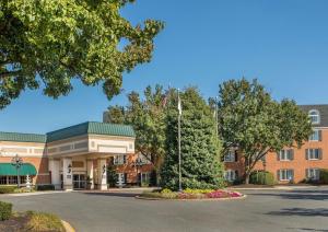 a rendering of the front of a school building at Hilton Wilmington/Christiana in Newark