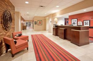 a lobby of a hospital with a waiting room at Hampton Inn & Suites Omaha Southwest-La Vista in La Vista