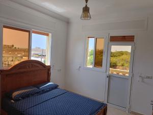 Postelja oz. postelje v sobi nastanitve Apartamentos Beach Tahadart, Asilah