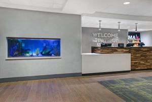 a lobby with a welcome to the department of the department of anthropology at Hampton Inn Westfield in Westfield