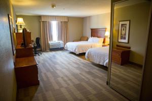 Кровать или кровати в номере Hampton Inn & Suites Grenada