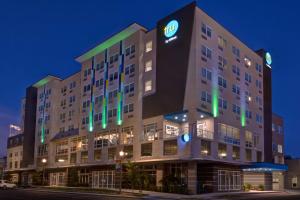 a building with a sign on the front of it at Tru By Hilton St. Petersburg Downtown Central Ave in St. Petersburg