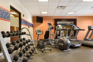 a gym with treadmills and weights in a room at Hampton Inn & Suites Mission in Mission