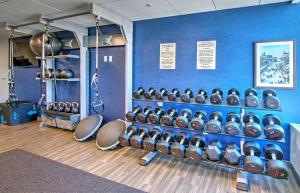 a gym with a bunch of helmets on a wall at Hampton by Hilton Ottawa in Ottawa