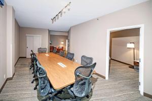 a conference room with a long table and chairs at Hampton by Hilton Ottawa in Ottawa
