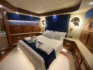 a large bed in the middle of a boat at Bodrum Private Yacht Rental in Bodrum City
