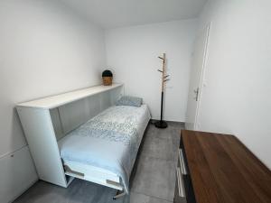Postel nebo postele na pokoji v ubytování Apartma Rebolj