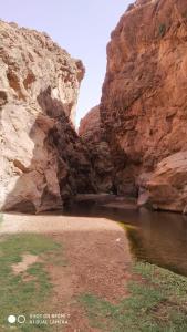a body of water in a rocky canyon at Auberge oued dades in Boumalne