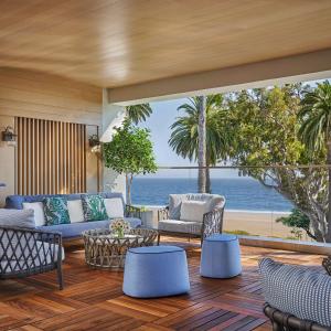 a living room with a view of the ocean at Oceana Santa Monica, LXR Hotels & Resorts in Los Angeles