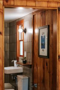 a bathroom with a toilet and a sink at The Leeway in Mount Tremper