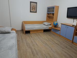 Postel nebo postele na pokoji v ubytování Apartment Grando
