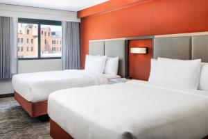 Voodi või voodid majutusasutuse SpringHill Suites by Marriott Dallas Downtown / West End toas