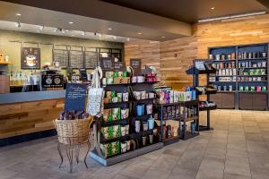 a store with a display of products in a store at Hilton St. Louis at the Ballpark in Saint Louis +113 photos