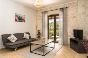 Μια τηλεόραση ή/και κέντρο ψυχαγωγίας στο Barbara Ann Apartments