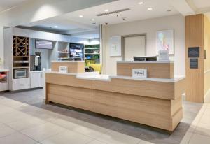 a store with a cashier counter in a store at Hilton Garden Inn Irvine East/Lake Forest in Foothill Ranch