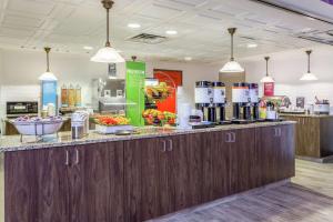 a store with a counter with fruits and vegetables on it at Hampton Inn & Suites Chicago - Libertyville in Libertyville