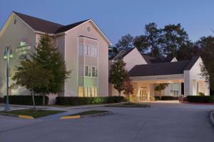 een weergave van de voorkant van een hotel bij Homewood Suites Houston Kingwood Parc Airport Area in Kingwood