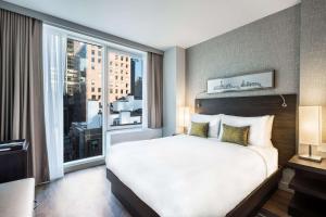 Postel nebo postele na pokoji v ubytování The Bernic Hotel New York City,Tapestry Collection by Hilton + 33 fotografií