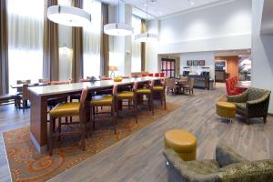 a large dining room with a large table and chairs at Hampton Inn & Suites Page - Lake Powell in Page