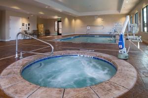 a jacuzzi tub in the middle of a room at Hampton Inn & Suites Page - Lake Powell in Page