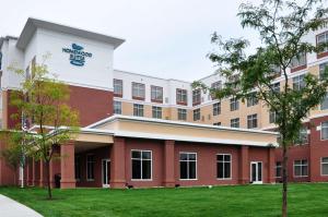 a rendering of the front of a hospital building at Homewood Suites - Doylestown in Warrington