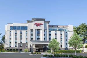 a rendering of the front of a hotel at Hampton Inn Rochester Penfield, Ny in Penfield