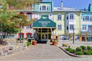 a building with a sign that reads hammond suites at Homewood Suites by Hilton Mont-Tremblant Resort in Mont-Tremblant