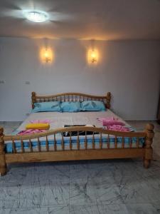 Cama ou camas em um quarto em Casa Iuliana