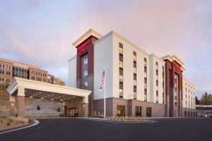 eine Darstellung der Vorderseite eines Hotels in der Unterkunft Hampton Inn Salt Lake City Cottonwood in Holladay