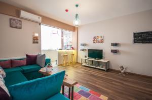 TV a/nebo společenská místnost v ubytování Newway Apartments