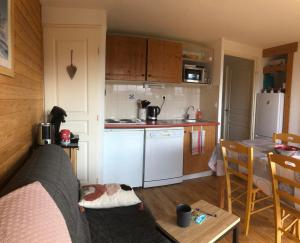 Kuchyň nebo kuchyňský kout v ubytování Appartement 2 chambres vue exceptionnelle