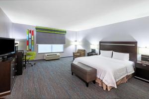 เตียงในห้องที่ Hampton Inn & Suites Houston/League City