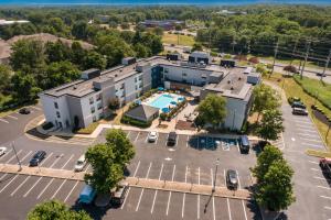 an aerial view of a building with a parking lot at Hampton Inn Princeton in Princeton