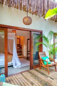 En eller flere senge i et værelse på Casa Rudá Condominio Icatu + 36 billeder