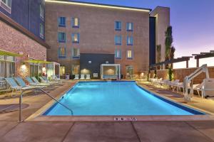 a swimming pool in front of a hotel at Hampton Inn Chula Vista Eastlake in Chula Vista