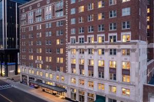 a view of a large brick building with windows at DoubleTree Suites by Hilton Hotel Detroit Downtown - Fort Shelby in Detroit