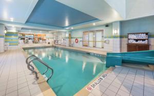 a large swimming pool in a hospital at Hampton Inn & Suites by Hilton Moncton in Moncton