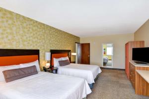 เตียงในห้องที่ Home2 Suites by Hilton Albuquerque Downtown/University