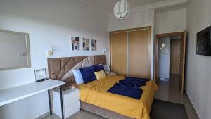 Letto o letti in una camera di Asilah Marina golf- Azur vue golf et mer