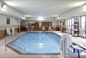 a large swimming pool in a hotel room at Hampton Inn Waterloo in Waterloo