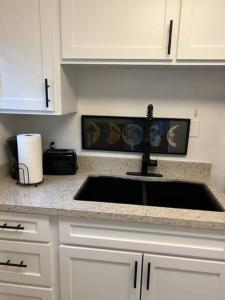 a kitchen with a sink and a counter top at Walk 2 beach A C W D Work Desk Renovated in Hermosa Beach