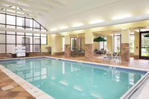 a large swimming pool in a large building at Hampton Inn Clarks Summit in Clarks Summit