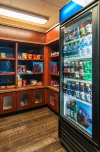 a refrigerator in a store with its door open at Hampton Inn Boise - Airport in Boise
