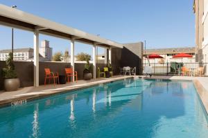 a swimming pool on top of a building at Home2 Suites by Hilton Oklahoma City South in Oklahoma City