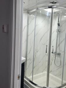Ένα μπάνιο στο Spacious & Cosy Holiday Home in Manchester +40 φωτογραφίες