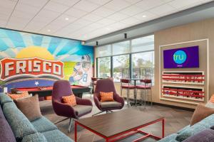 a waiting room at a fast food restaurant at Tru By Hilton Frisco Dallas, Tx in Frisco