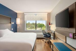 Tru By Hilton Frisco Dallas, Tx客房内的一张或多张床位